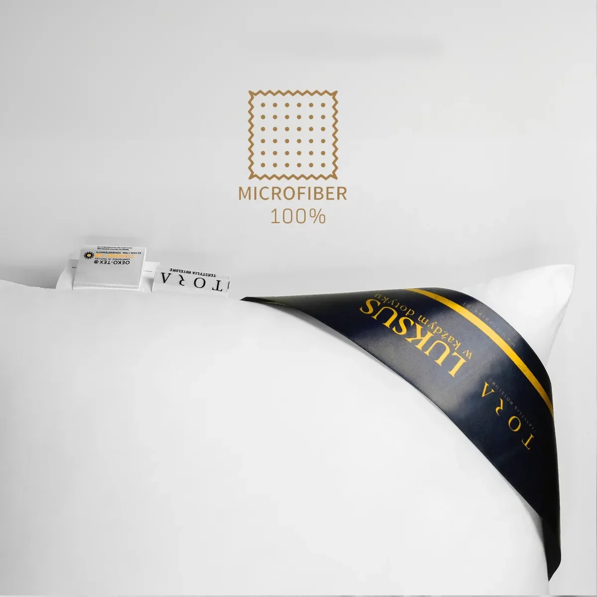 Metka TORA Luksus na poduszce hotelowej CLASSIC 1200g 70×80 z oznaczeniem 100% mikrofibra